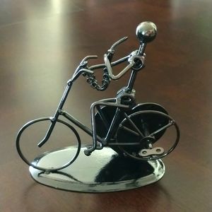 Saxophone player on bike Nuts and Bolts sculpture and music box